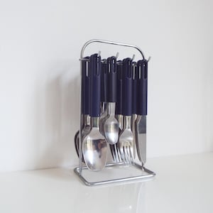 Vintage cutlery, 16 pc flatware, knives spoons forks and small spoons, stainless steel and blue handles, 1980 Italian design