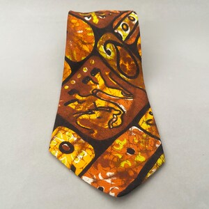 1970s Black Elephant Print Tie by The Men&#39;s Store at Sears | 70s Vintage Brown, Orange, and Yellow Tie Dye Necktie