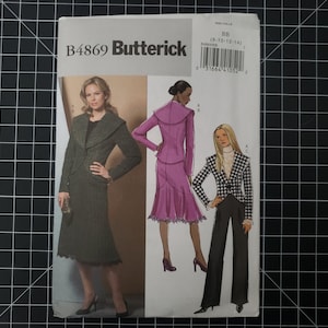 May include: A Butterick sewing pattern, B4869, featuring illustrations of women's suits. The suits include a green tweed coat and skirt, a pink suit with a flared skirt, and a black and white checkered blazer with black pants.