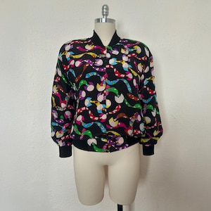 1990s Silk Bomber Style Jacket by Spenser Jeremy, Medium to Large | 90s Black Novelty Print Coat (M, L, 51-33)