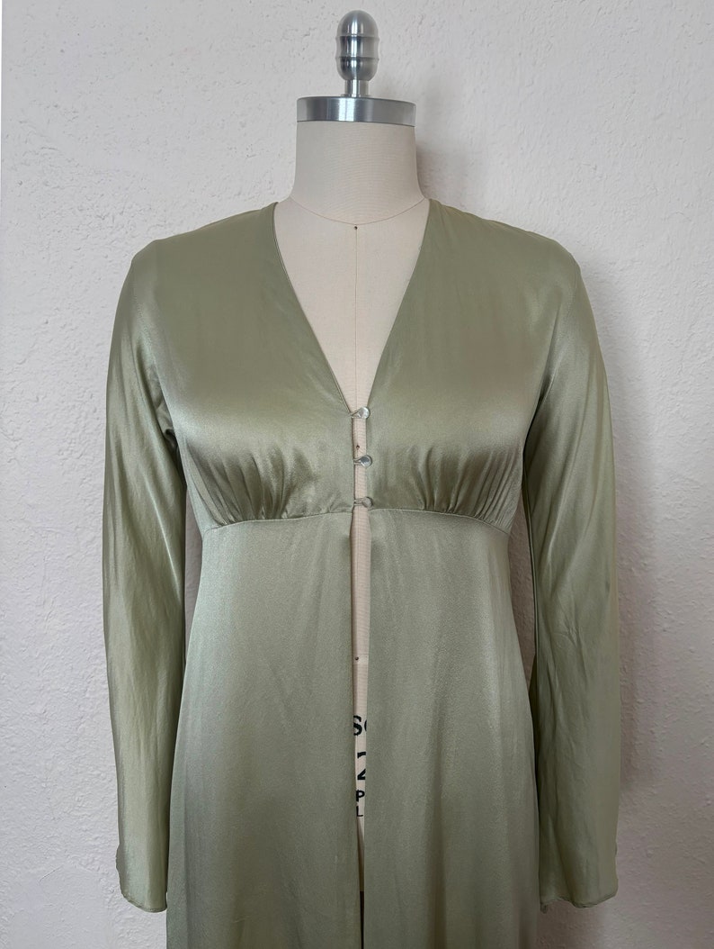 Bodice front view of 2000s y2k vintage new with tags sage green silk charmeuse robe by Patricia Fieldwalker, size medium to large.