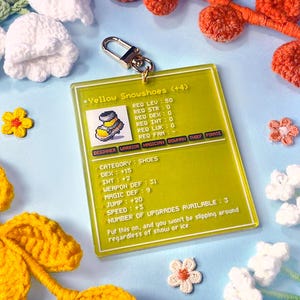 Llavero acrílico con raquetas de nieve amarillas / Ilustraciones pixeladas / Llavero nostálgico de MapleStory