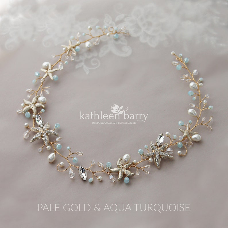May include: A delicate gold and aqua turquoise bridal hair vine with starfish and pearl accents. The vine is perfect for a beach wedding or a bohemian style.