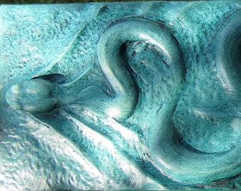 Tuile de sculpture en relief en béton de serpent nageant