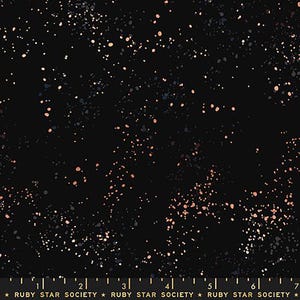 May include: Black fabric with a scattered pattern of small, metallic gold and copper dots. The fabric has a subtle sheen and a soft, smooth texture.