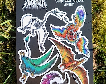 May include: Black sticker sheet with illustrations of pterosaurs and a dinosaur skeleton. The sheet has the text "PATREON June 2024 Sticker Sheet" and the artist's handle, "@PhaseMoth".