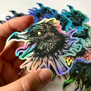 Raven & Bone Necklace HOLOGRAPHIC Vinyl Sticker, Fantasy Sticker, crow, corvid Sticker, Bird, Shiny, Dungeons and Dragons 5e