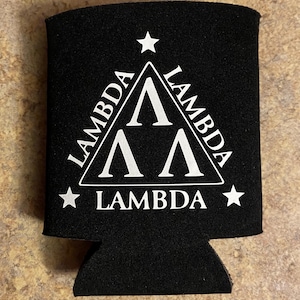 May include: Black foam can cooler with a white triangle design featuring the word "Lambda" and three white stars.