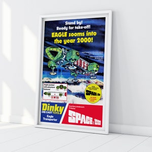 May include: A vintage Dinky Die Cast Toys advert featuring a green and red Eagle Transporter spaceship from the Gerry Anderson TV series "Space: 1999". The advert features the text "Stand by! Ready for take-off! EAGLE zooms into the year 2000!" and "Space: 1999".
