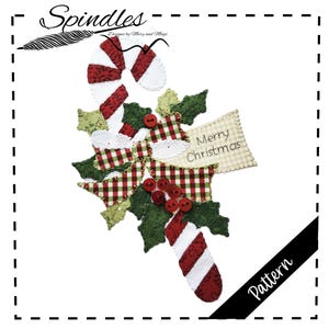 May include: A festive Christmas-themed applique pattern featuring a candy cane, holly leaves, and berries. The design includes red and white striped candy canes, green holly leaves, red berries, and a "Merry Christmas" banner. The word "Pattern" is also visible.