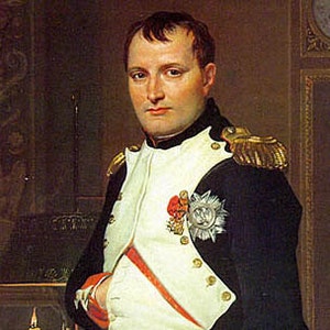 May include: A portrait painting of Napoleon Bonaparte in military uniform. He is wearing a white shirt with a red sash and a black jacket with gold trim. He has a serious expression on his face.