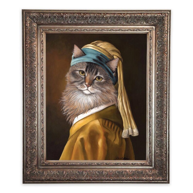 May include: A framed painting of a cat in the style of Johannes Vermeer's "Girl with a Pearl Earring." The cat wears a blue headscarf and a yellow dress, with a brown background. The frame is ornate with a bronze finish.