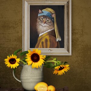May include: A framed painting of a cat in the style of Vermeer's "Girl with a Pearl Earring." The cat wears a blue headscarf and a yellow and brown outfit. Sunflowers in a gray pitcher and lemons sit on a wooden table.