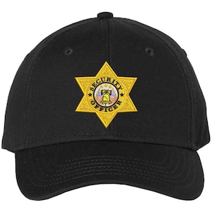 May include: Black baseball cap with a gold embroidered star badge that says "SECURITY OFFICER".