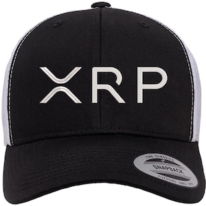 May include: Black and white trucker hat with a white embroidered XRP logo. The hat has a mesh back and a black snap closure.