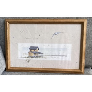 May include: A handmade wooden sign with the text "Welcome" in a playful font. The sign is painted white with a distressed finish, and features a decorative floral design in shades of pink and green. It measures approximately 12 inches wide.