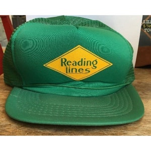 May include: Green trucker hat with a yellow diamond logo that says "Reading Lines" in green letters.