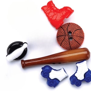 May include: Assortment of colorful plastic buttons featuring sports themes.  Includes a baseball bat, basketball, roller skates, and bowling pins.