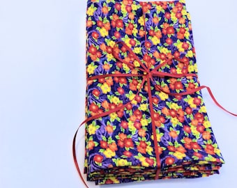 Six Pretty Purple Napkins with Yellow, Red, and Orange Flowers; Set of 6