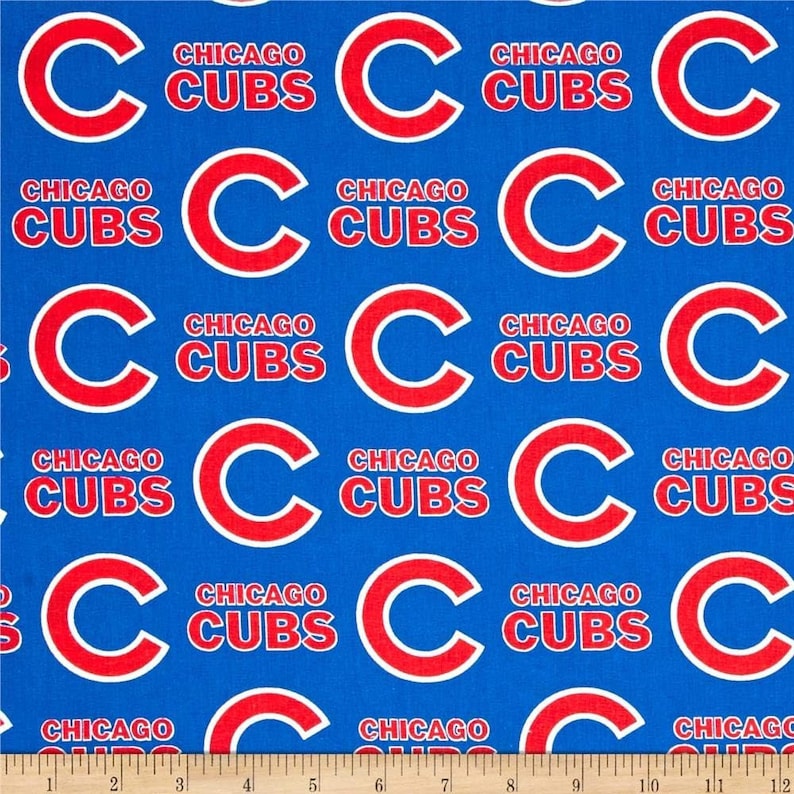 May include: A blue fabric with a repeating pattern of red "C" logos and the text "Chicago Cubs".