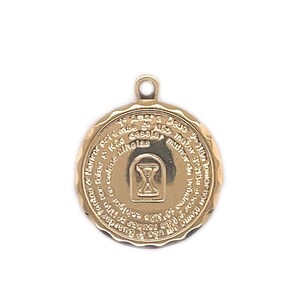 May include: Gold-toned pendant with an inscription around the edge and an hourglass design in the center. The inscription reads "The sands of time are always slipping away, make the most of every moment."