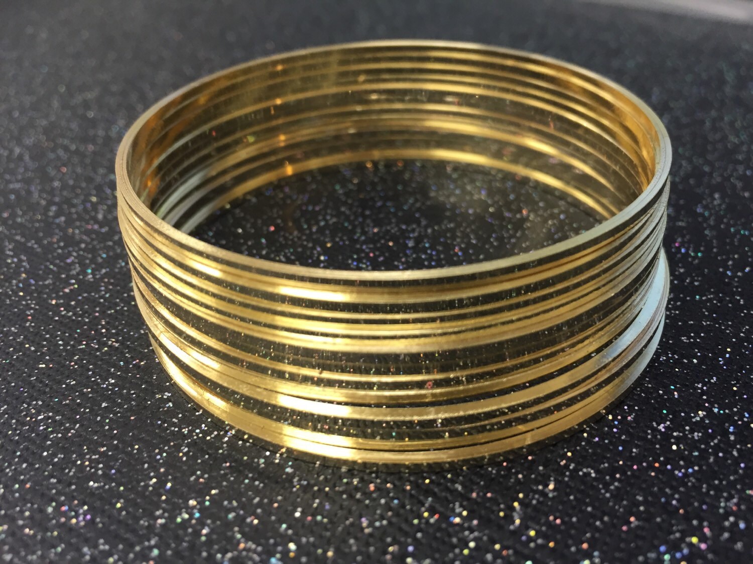 Gold bangles shop thin designs