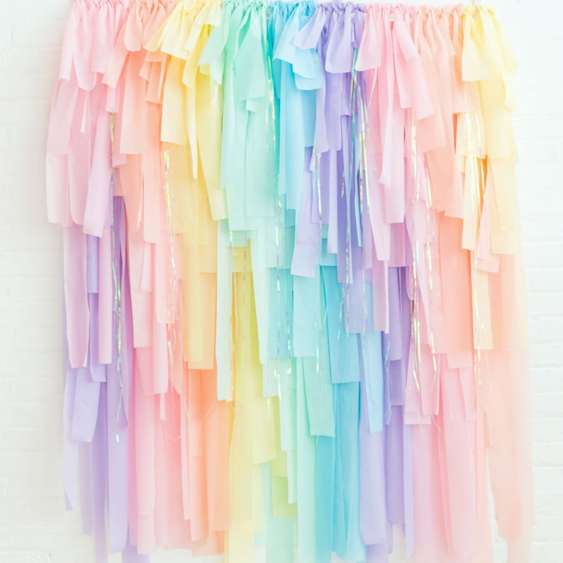 Unicorn Rainbow DIY Streamer Fringe Backdrop Kit. A lovely backdrop for a virtual birthday party. (onestylishparty)
