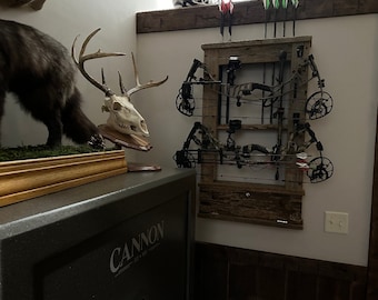 Holds 2 Bows. Custom Barnwood Archery Bow Rack made from old Florida Pecky Cypress and other old wood species. Arrows are vertical.