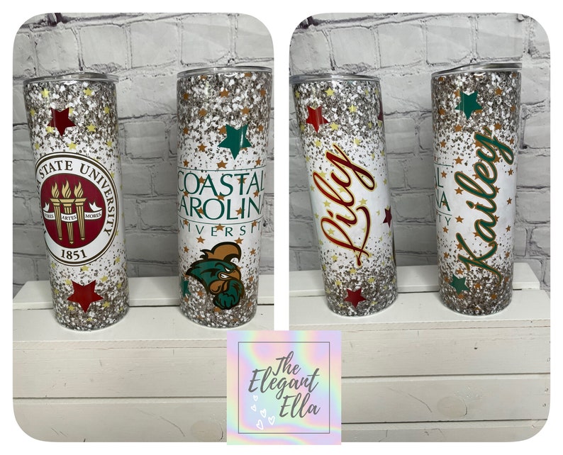 May include: Glitter-covered tumblers with university logos and names. One tumbler features the Coastal Carolina University logo and another has the name "Lily" in red. The tumblers are decorated with gold stars and red and green accents.