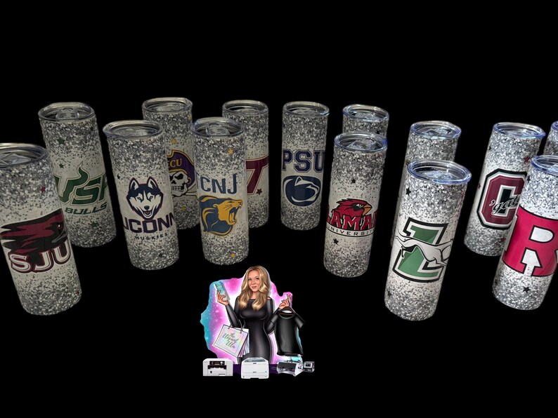 May include: A collection of glitter-covered tumblers featuring various college logos and mascots. The designs include logos for UConn Huskies, Penn State, and others. The tumblers are cylindrical and have a silver glitter finish.