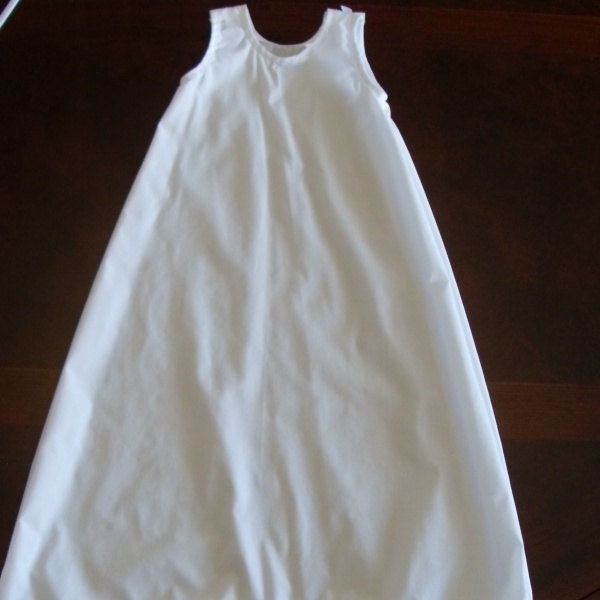 Baby slip with lace edge and shoulder closures