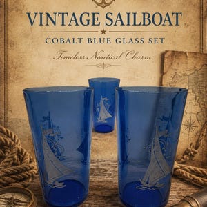 May include: Three cobalt blue glass tumblers featuring etched sailboat designs. The text VINTAGE SAILBOAT COBALT BLUE GLASS SET Timeless Nautical Charm is displayed above the glasses, accompanied by an anchor icon and nautical map imagery.