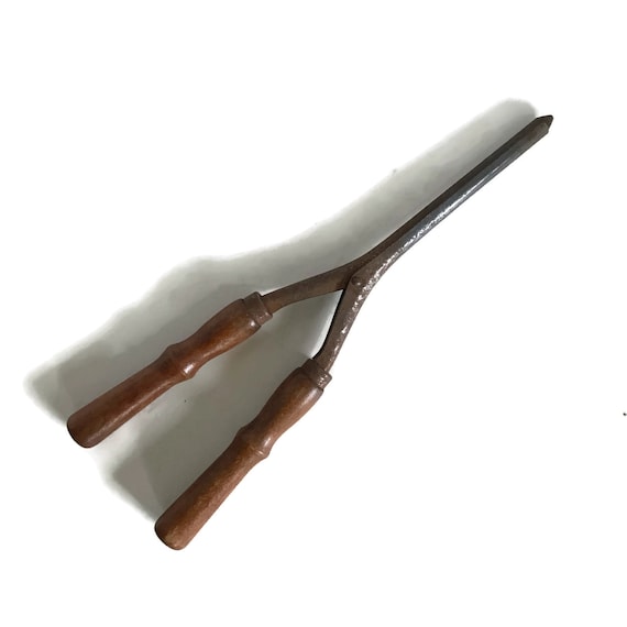Antique hair curling iron hotsell