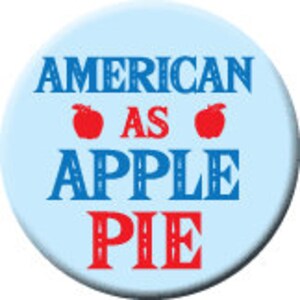 May include: A blue and red button with the text "AMERICAN AS APPLE PIE" in a vintage font.