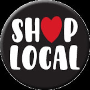May include: Black and white button with the text "SHOP ♥ LOCAL" in white with a red heart.