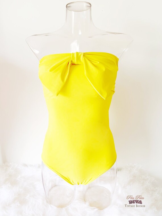 yellow strapless one piece swimsuit