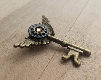 Bronze Winged Key Metal Brooch with Gear and Watch Face