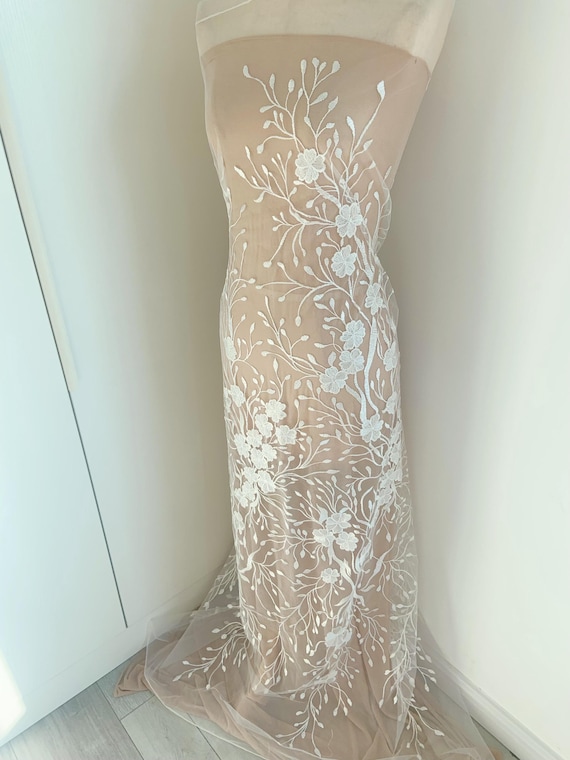 Off white embroidered organza fabric with flowers