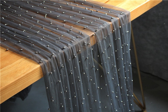 Black tulle fabric with silver pearls