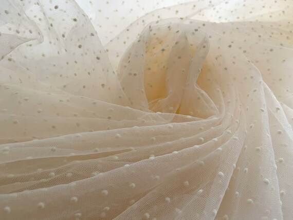 Beige tulle with polka dots