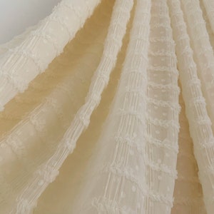Ivory beige creased chiffon fabric with ruffles and polka dots, chiffon fabric with frills for dress couture