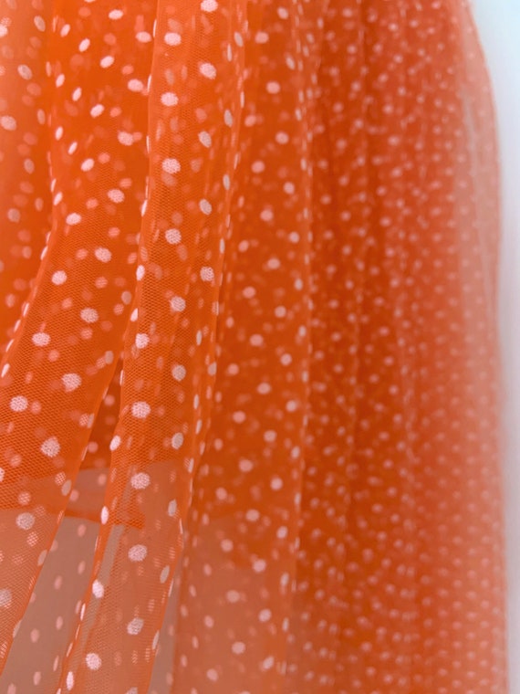 Orange polka dot tulle fabric