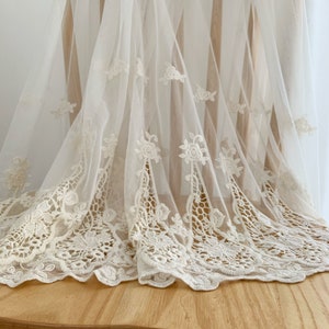 ivory embroidered tulle lace fabric with eyelet florals , beige mesh lace fabric