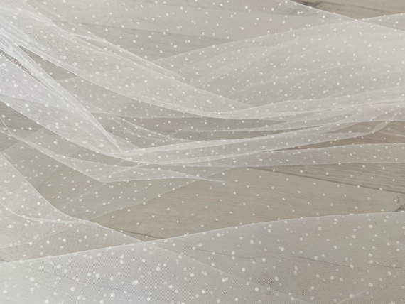 Off white tulle fabric with flocking dots. white mesh with polka dots for dress, prop
