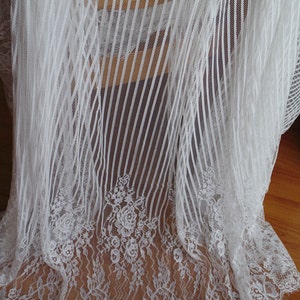 off white Chantilly lace fabric with scalloped edge