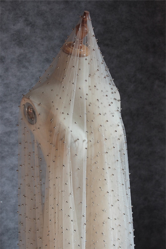 Nude tone tulle fabric with pearls