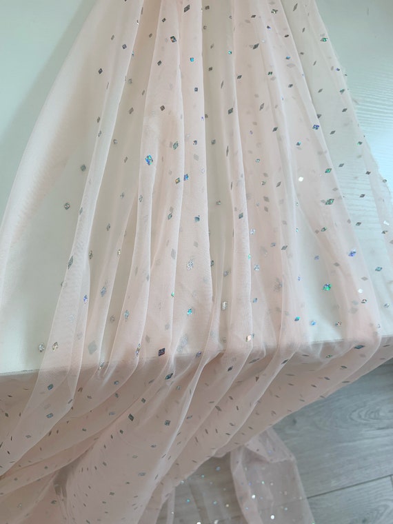 Peach tulle fabric with sparkling sequins