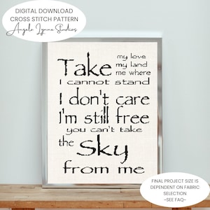 May include: Black and white cross stitch pattern with the text "Take my love my land me where I cannot stand I don't care I'm still free you can't take the Sky from me".