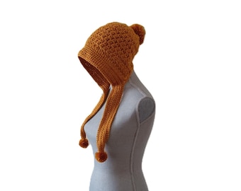 Gorro chullo de crochet hecho a mano con orejeras: acrílico dorado