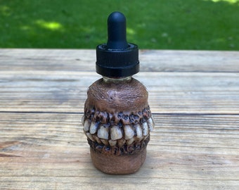 Teeth bottle “Mostly Gums”